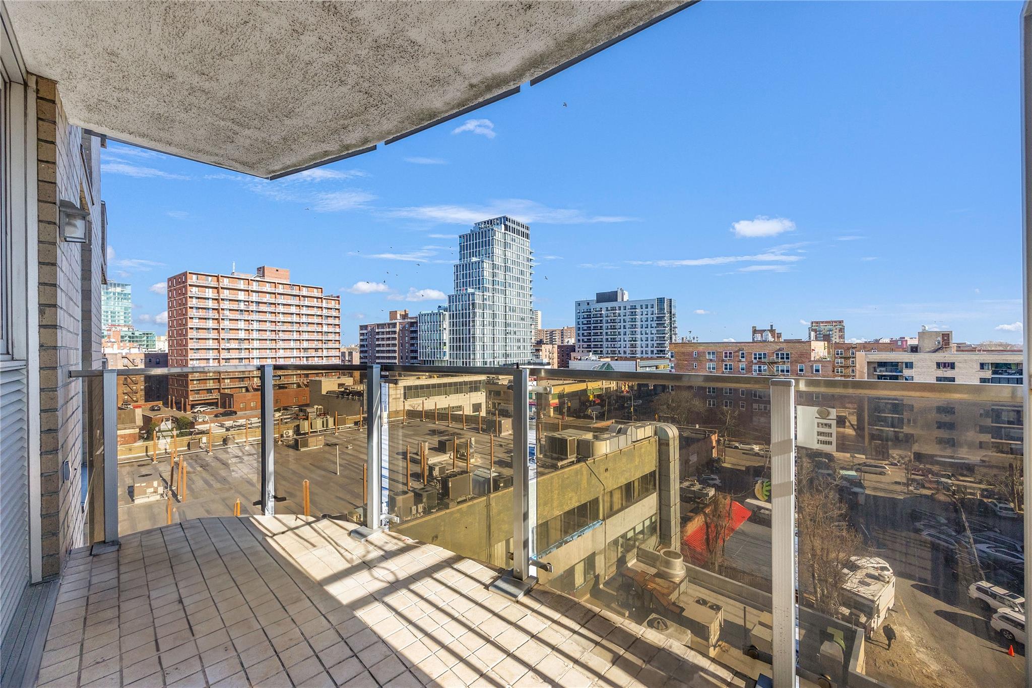 133-38 Sanford Avenue, Unit 20B Queens, NY 11355 - Photo 2 of 6 a view of a balcony with an outdoor space