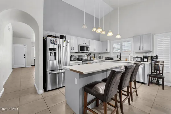 a room with pool table and a flat screen tv