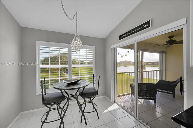 a view of a balcony with furniture