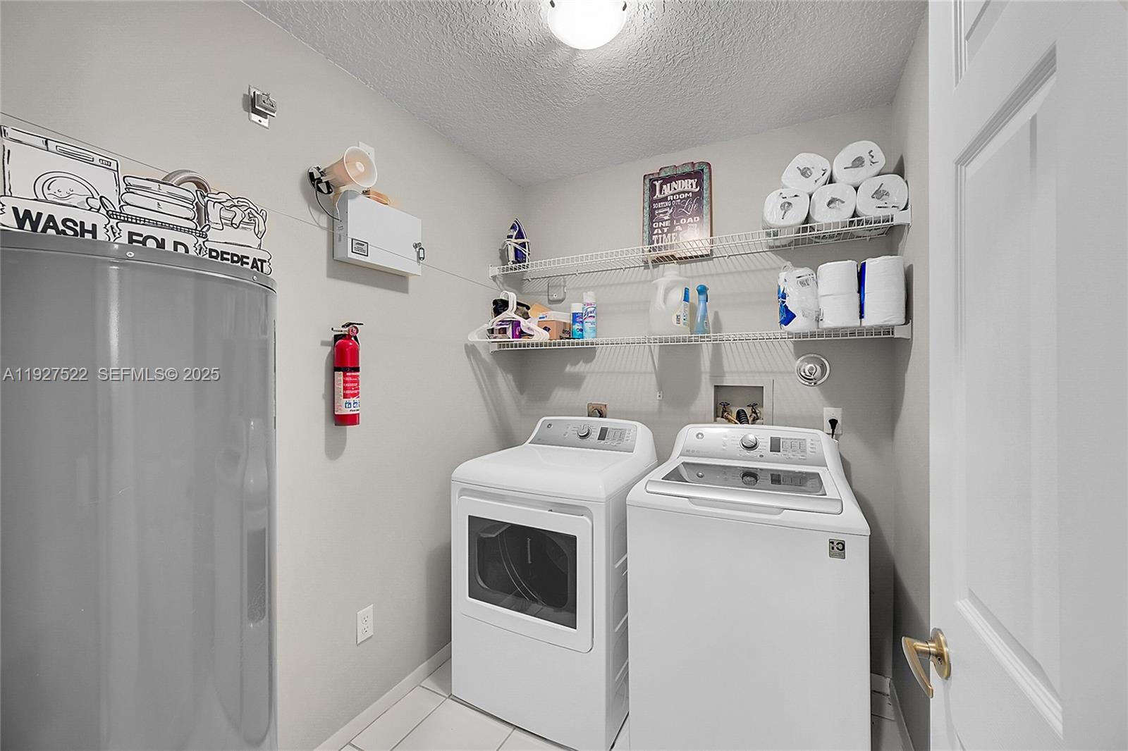 17317 Boca Club Boulevard, Unit 7 Boca Raton, FL 33487 - Photo 34 of 48 a room with storage and utility