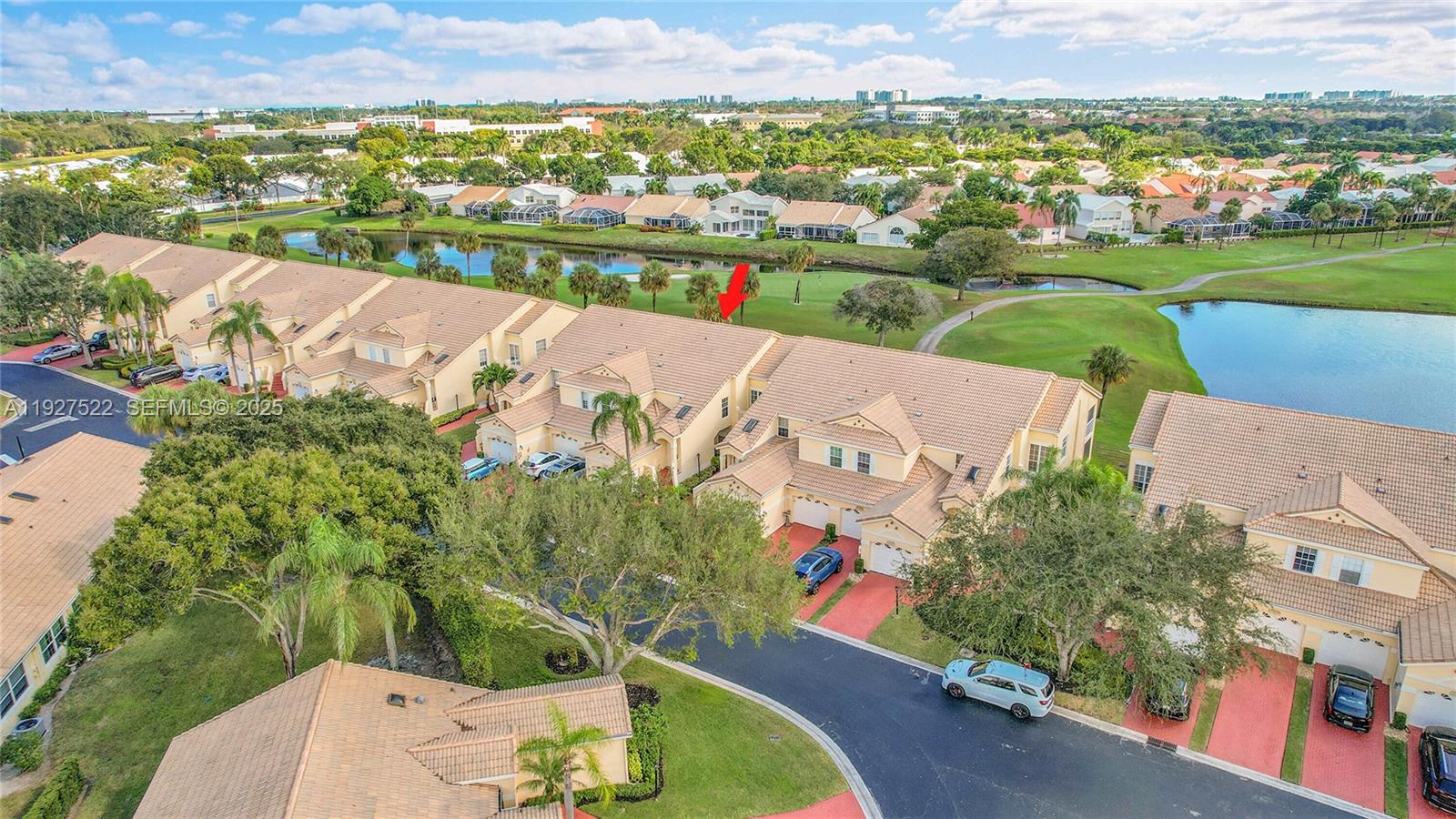 17317 Boca Club Boulevard, Unit 7 Boca Raton, FL 33487 - Photo 43 of 48 an aerial view of a house with a swimming pool