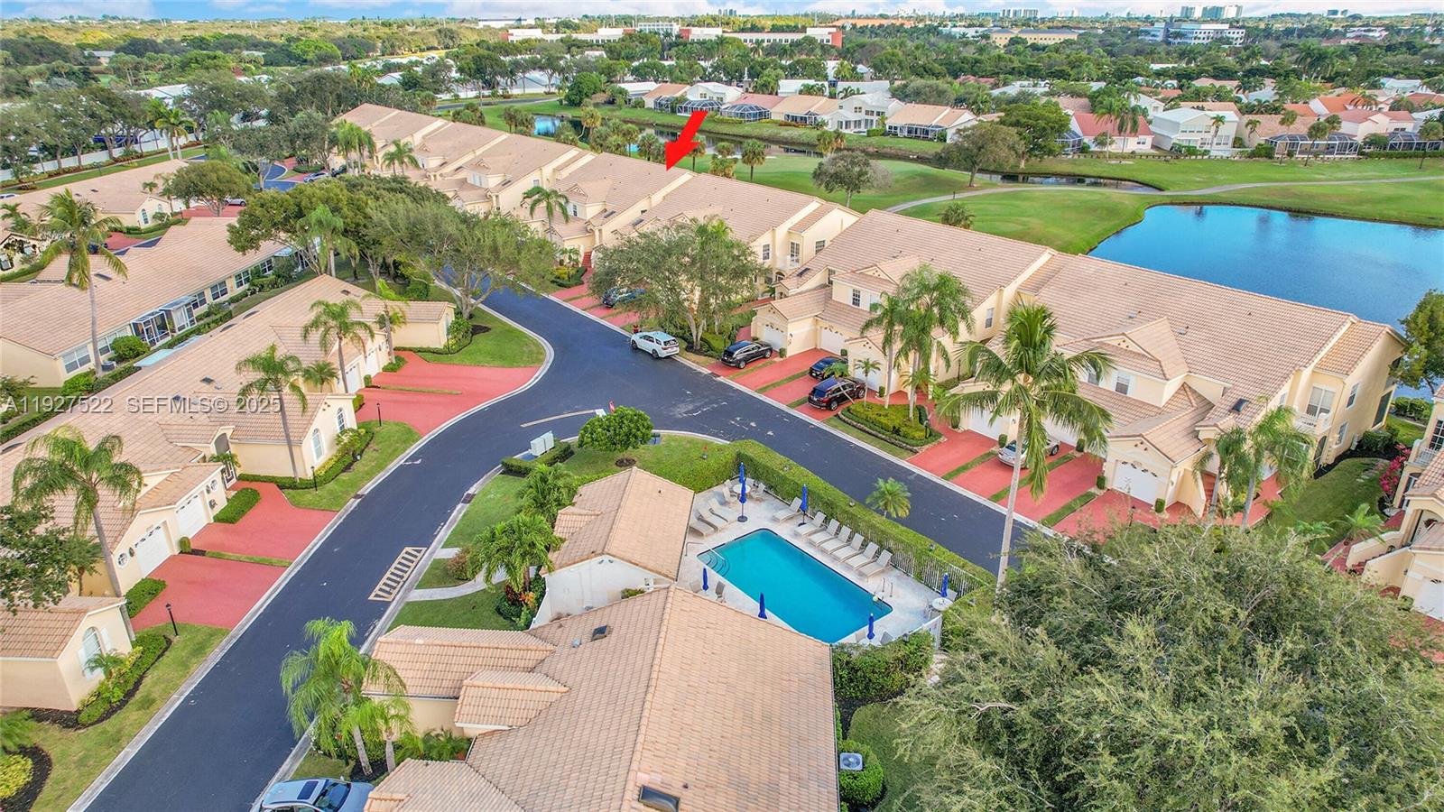 17317 Boca Club Boulevard, Unit 7 Boca Raton, FL 33487 - Photo 45 of 48 an aerial view of a city and lake view