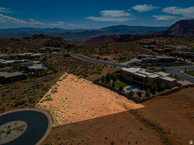 Basalt Cir Street, Unit 1027 St. George, UT 84770 - Photo 2 of 29 Drone / aerial view of a mountainous background