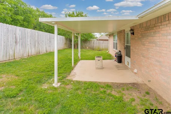 a view of a backyard with a garden
