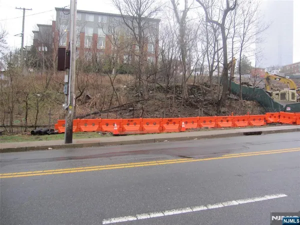 a view of street with a houses