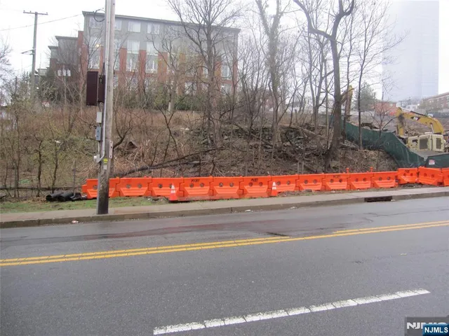 a view of street with a houses