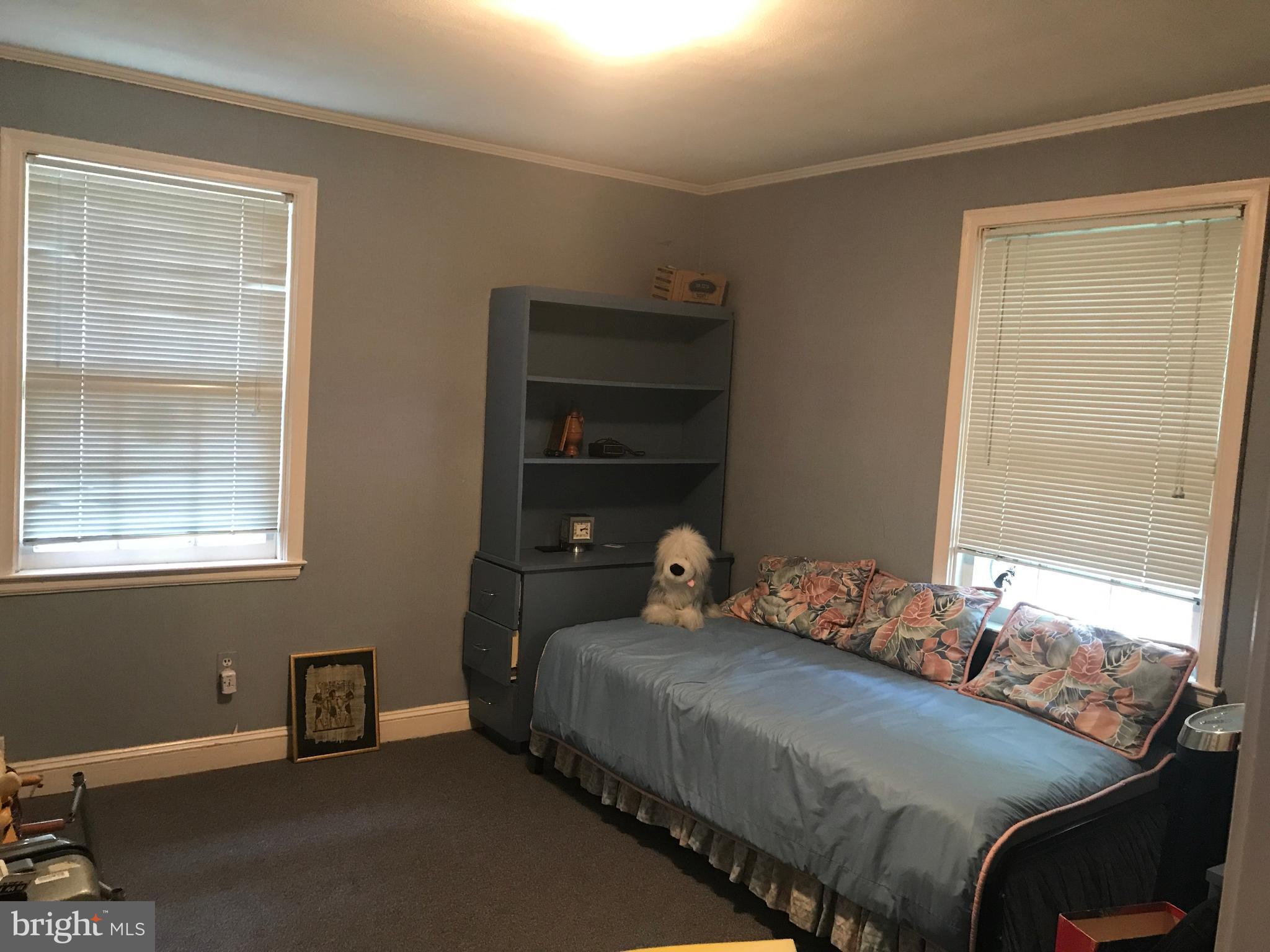 3311 Fallstaff Road Baltimore, MD 21215 - Photo 27 of 30 Nice size 3rd bedroom with hardwood under carpet