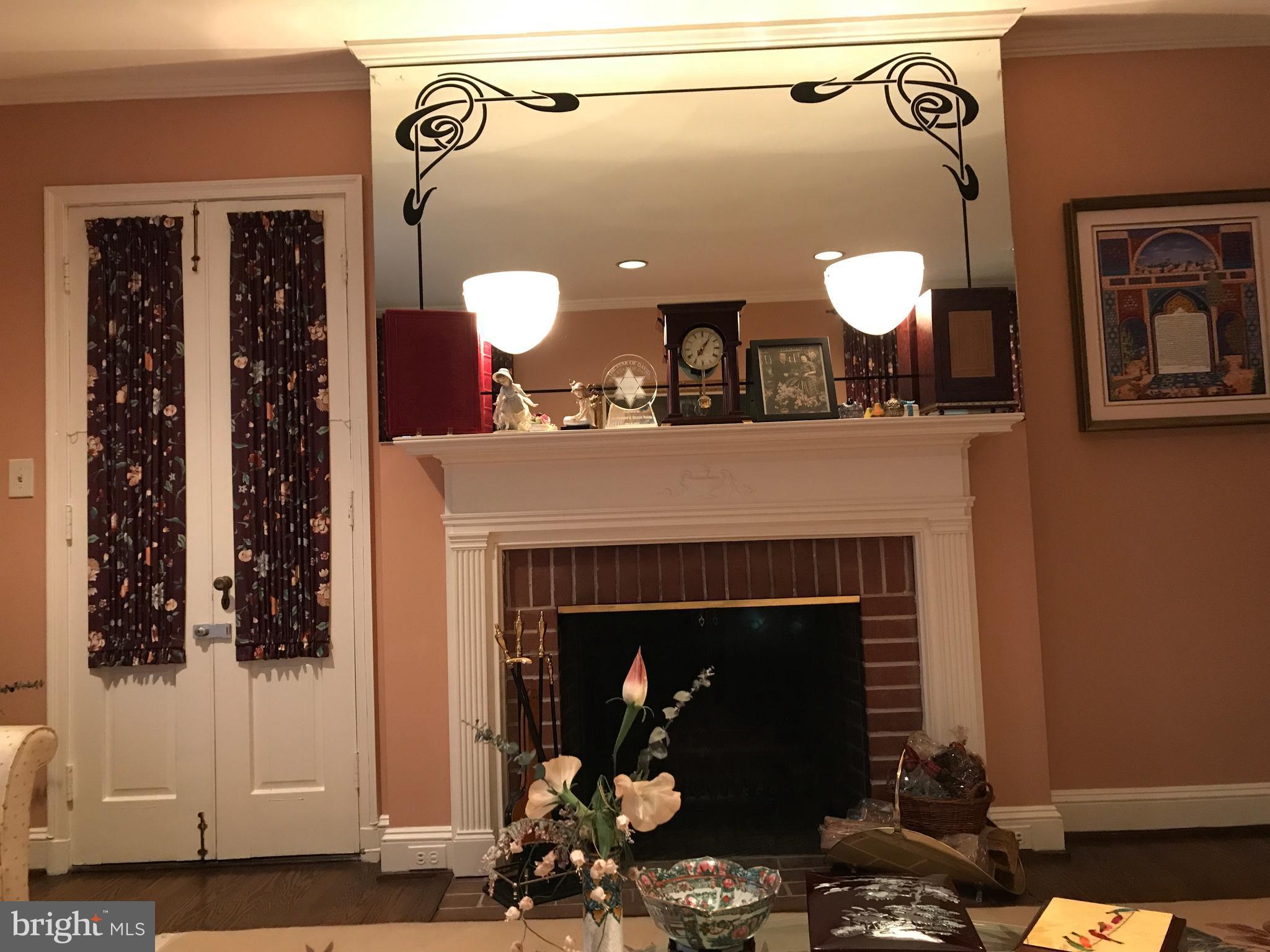 3311 Fallstaff Road Baltimore, MD 21215 - Photo 8 of 30 Living room working, wood burning fireplace