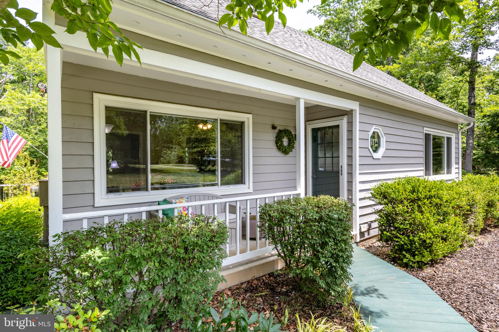 164 Oliver Lane Ruckersville, VA 22968 - Photo 32 of 39 Charming home with lush greenery.
