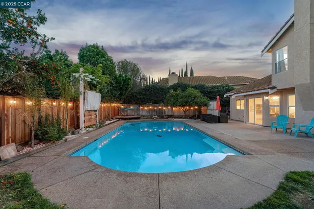a view of a hallway and interior of the house