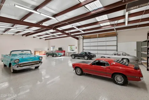 a view of parking garage with cars