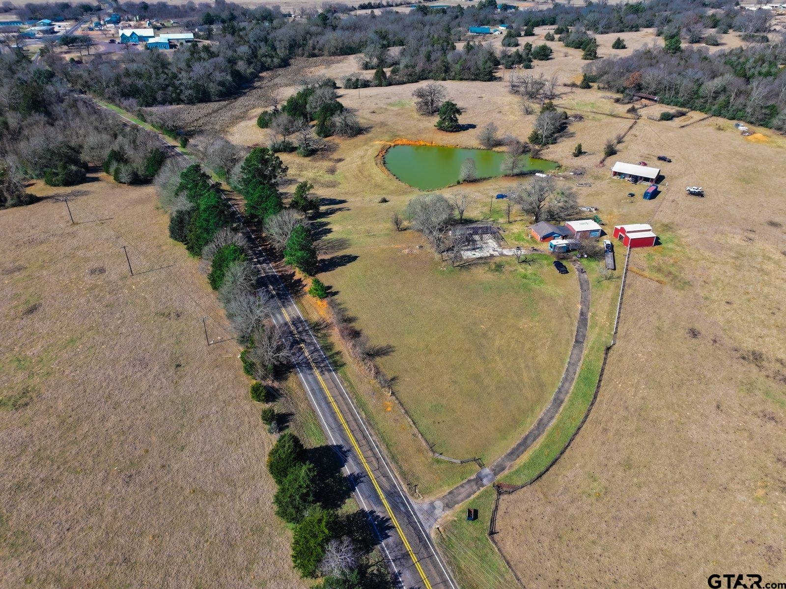 6820 Farm To Market Road 321 Tennessee Colony, TX 75861 - Photo 5 of 9 an aerial view of a swimming pool