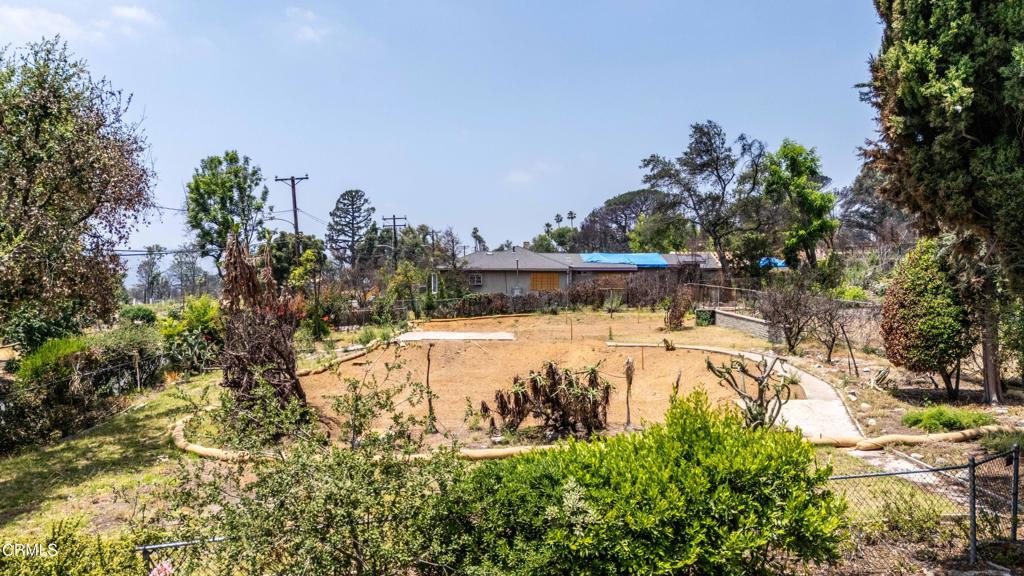 2989 Santa Rosa Avenue Altadena, CA 91001 - Photo 3 of 9 a view of a swimming pool with a yard
