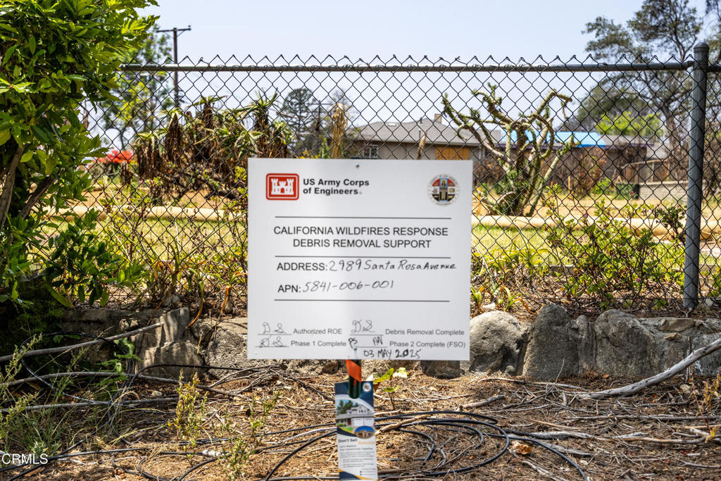 2989 Santa Rosa Avenue Altadena, CA 91001 - Photo 4 of 9 a sign on the side of a road