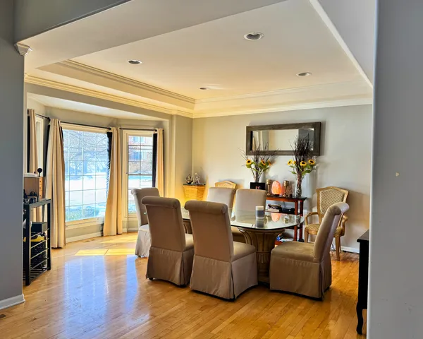 a living room with furniture and fireplace