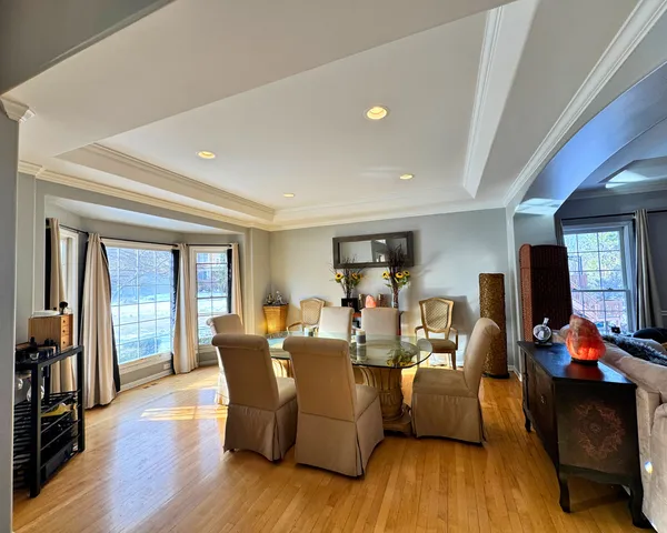 a lobby with furniture and a large window