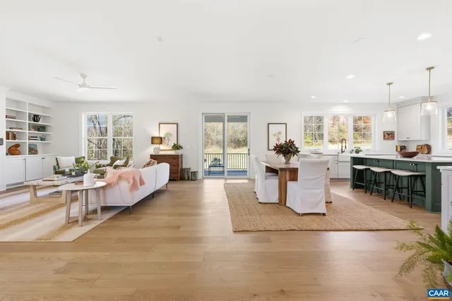 a living room with furniture and a view of living room