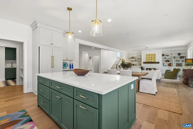 a room with a sink and a mirror