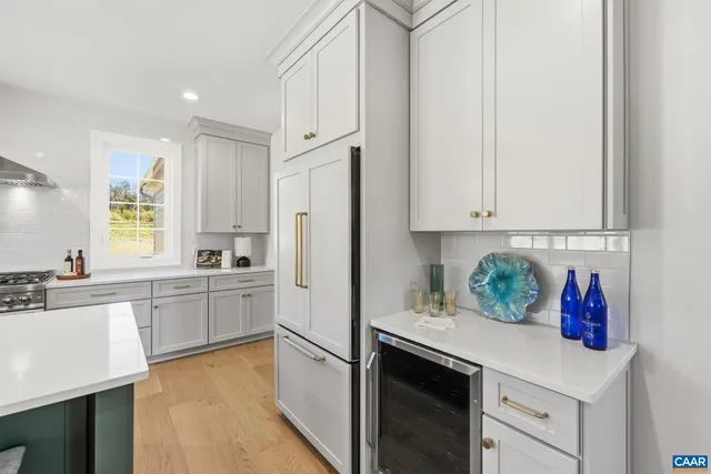 a bathroom with a double vanity sink a mirror and a