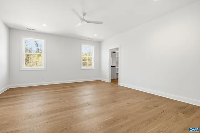 an empty room with windows