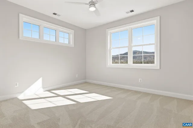 an aerial view of a house with swimming pool