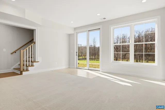 a view of a chairs and table in the balcony