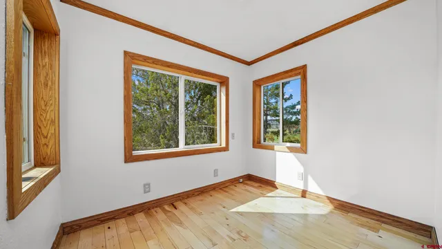 a view of bathroom with a sink toilet and mirror