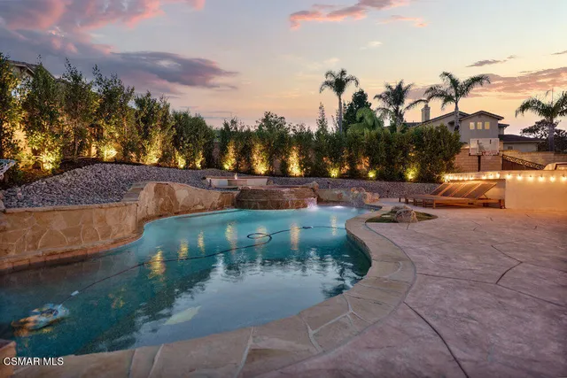 a view of a house with a swimming pool