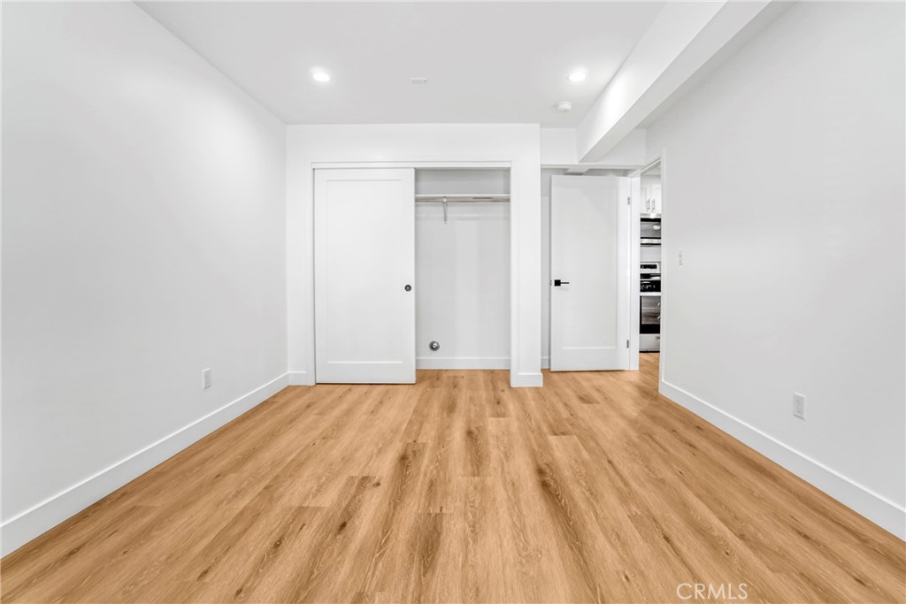 221 Sheldon Street El Segundo, CA 90245 - Photo 12 of 34 a view of an empty room and wooden floor