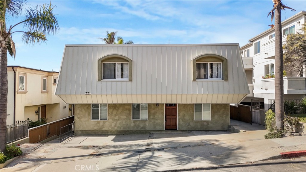 221 Sheldon Street El Segundo, CA 90245 - Photo 3 of 34 a front view of a building with entryway