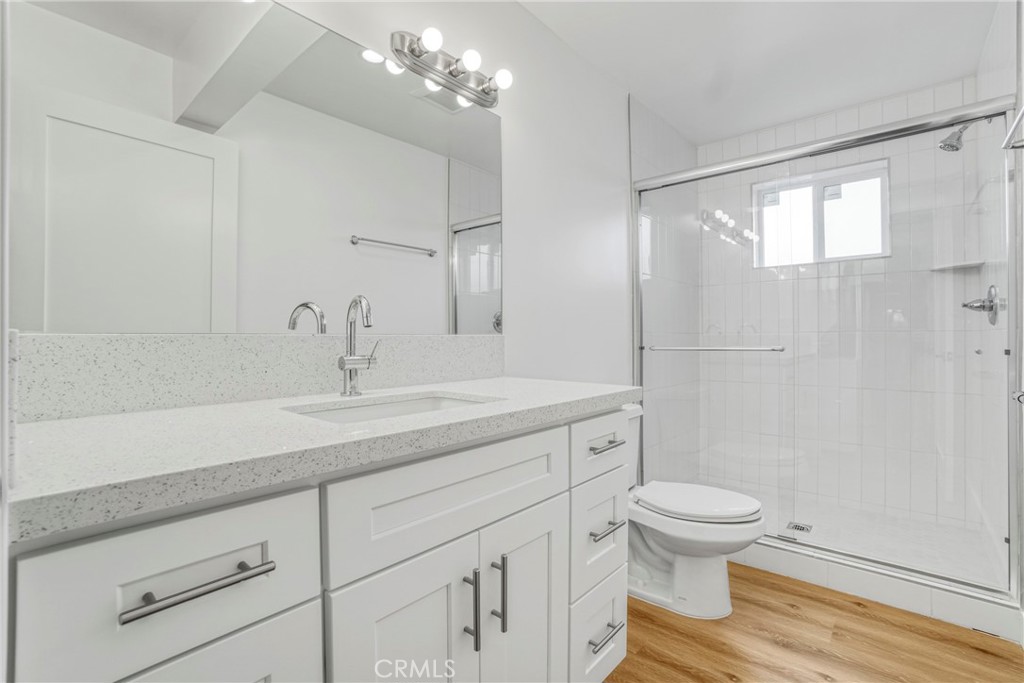 221 Sheldon Street El Segundo, CA 90245 - Photo 10 of 34 a bathroom with a sink a toilet and shower