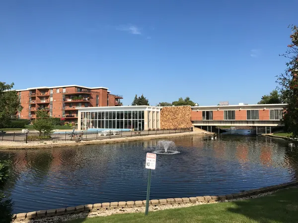 a view of swimming pool with a yard