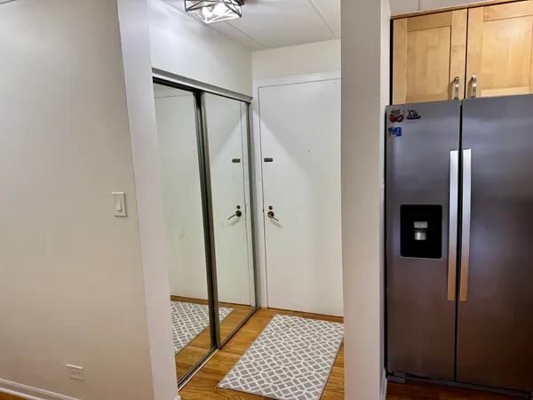 a kitchen with stainless steel appliances a refrigerator and a sink