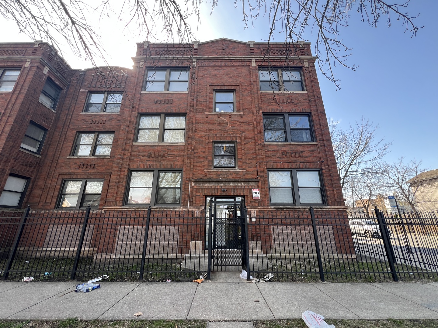 6902 South Michigan Avenue, Unit 3S Chicago, IL 60637 - Photo 1 of 8 front view of a brick house