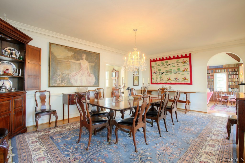 812 Shirley Plantation Road Charles City, VA 23030 - Photo 12 of 24 a view of a a dining room with furniture window and wooden floor