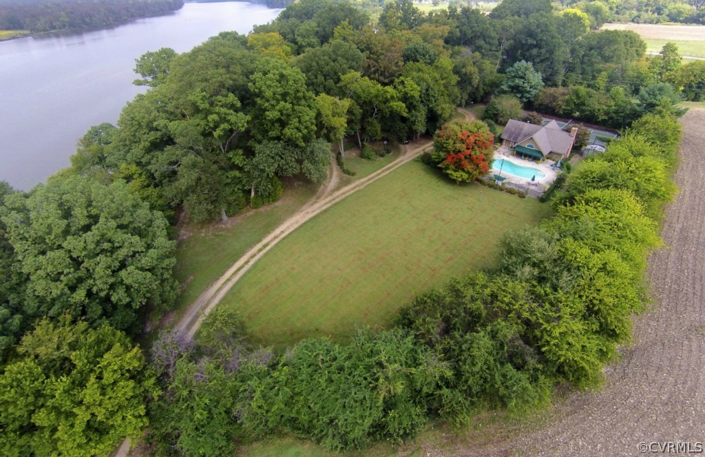 812 Shirley Plantation Road Charles City, VA 23030 - Photo 24 of 24 an aerial view of a house with a yard and lake view