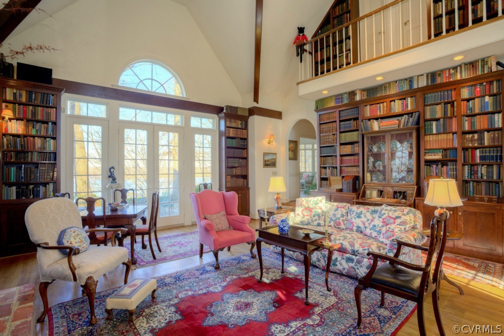 812 Shirley Plantation Road Charles City, VA 23030 - Photo 10 of 24 a view of a dining room with furniture and a book shelf