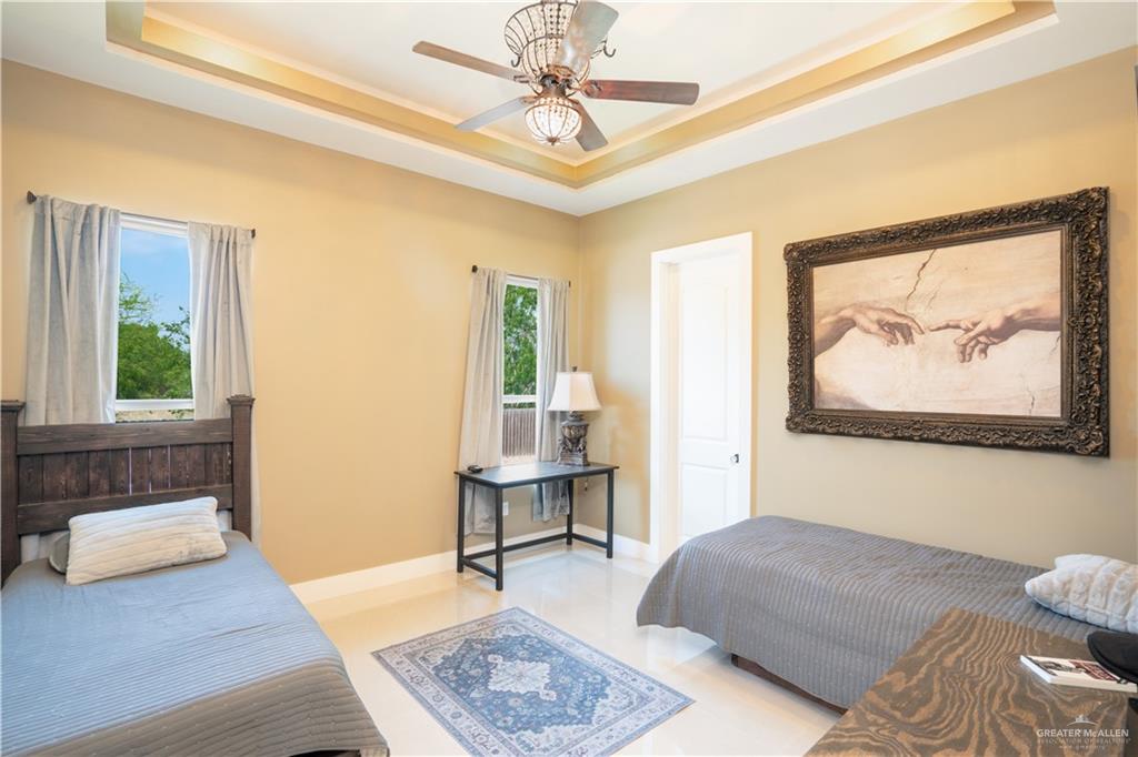 1627 South Midway Road Donna, TX 78537 - Photo 16 of 36 a living room with furniture and a window