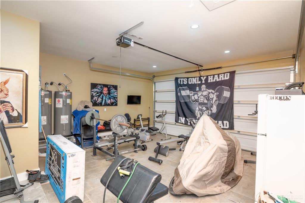 1627 South Midway Road Donna, TX 78537 - Photo 17 of 36 a view of a livingroom with furniture and a table