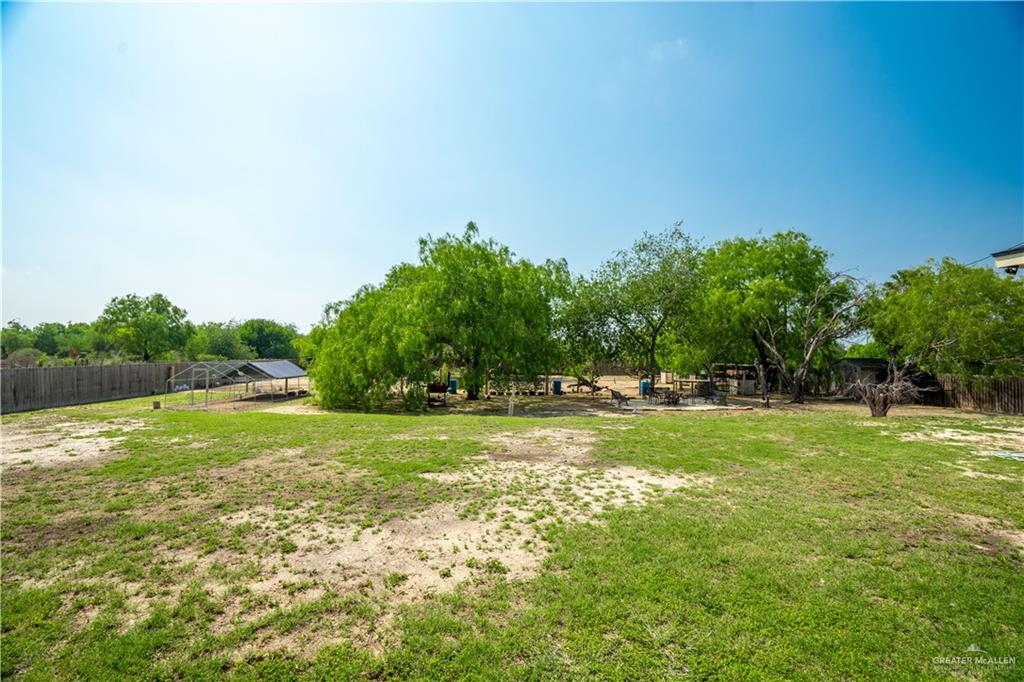 1627 South Midway Road Donna, TX 78537 - Photo 20 of 36 a view of field with trees in the background