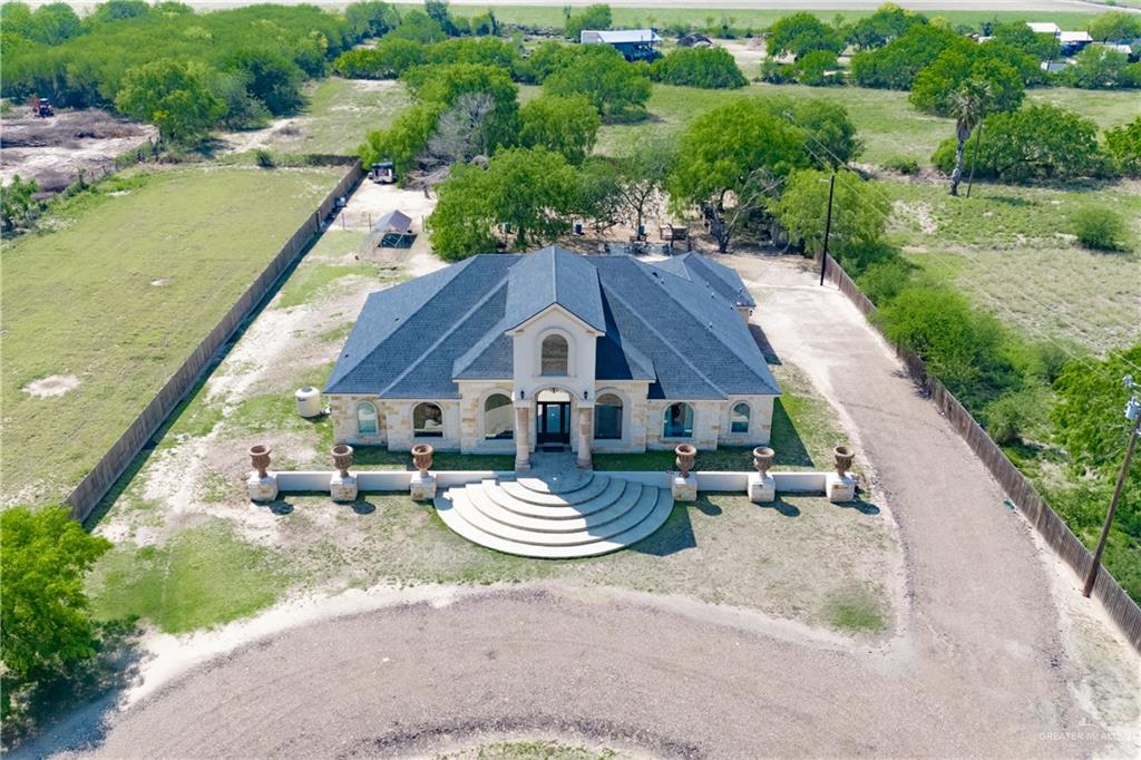 1627 South Midway Road Donna, TX 78537 - Photo 28 of 36 an aerial view of a house with garden space and lake view