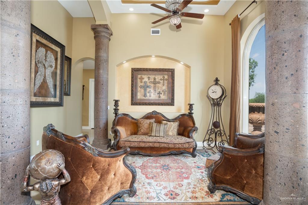 1627 South Midway Road Donna, TX 78537 - Photo 3 of 36 a living room with furniture and a window