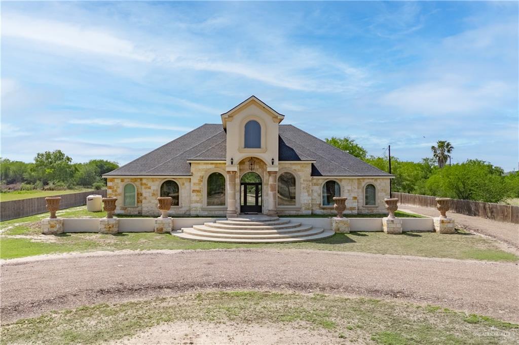 1627 South Midway Road Donna, TX 78537 - Photo 36 of 36 a front view of a house with garden