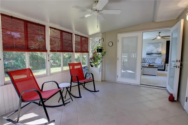 a outdoor living space with furniture and a potted plant