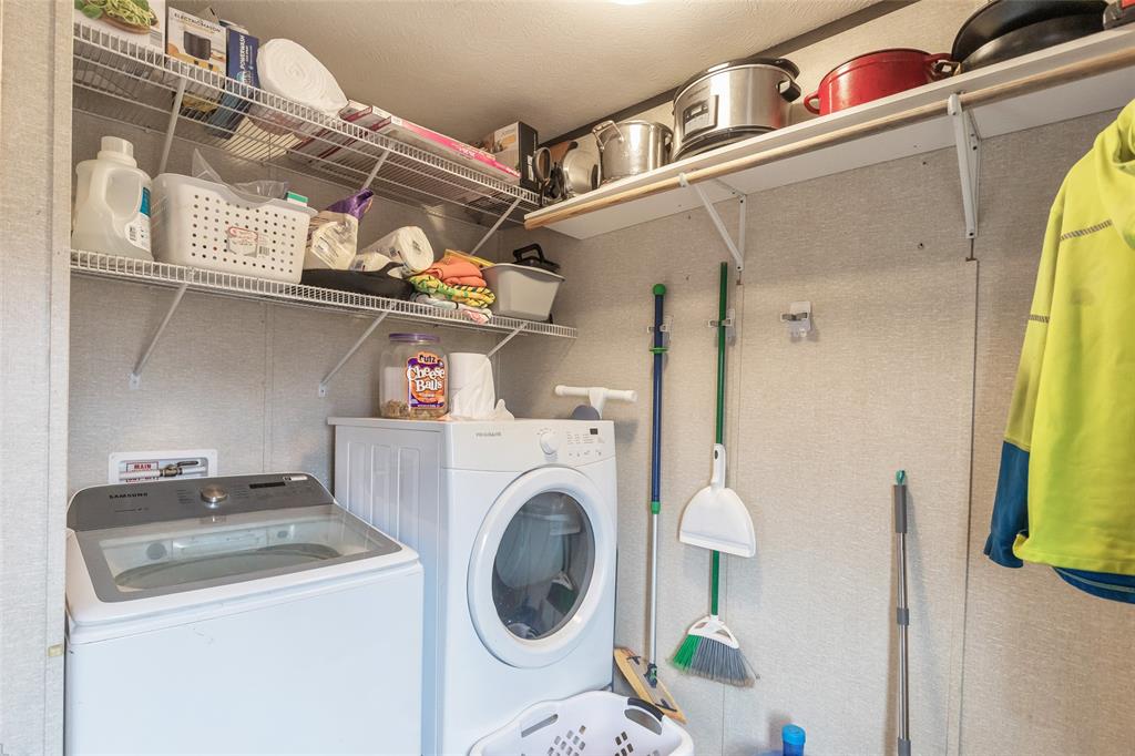 308 Marion Street Merkel, TX 79536 - Photo 16 of 20 a utility room with dryer and washer