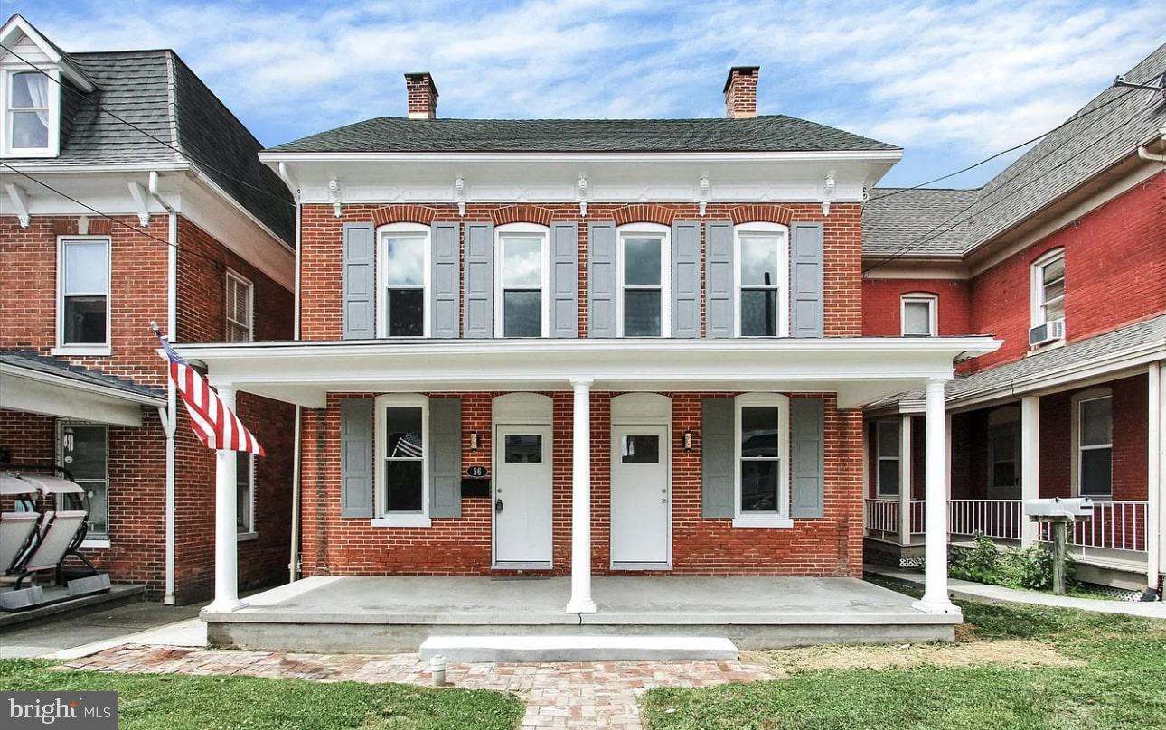 56 North Main Street Spring Grove, PA 17362 - Photo 1 of 25 a front view of a house with a yard