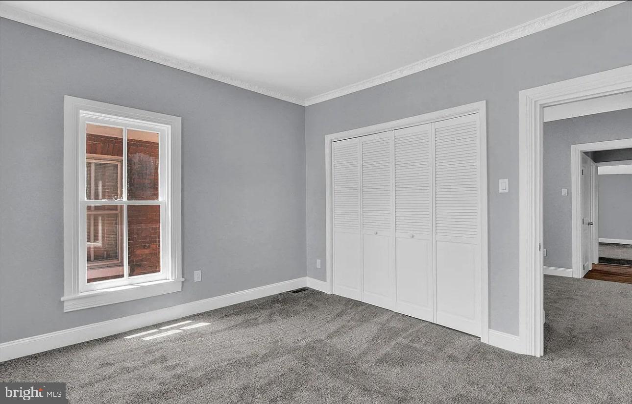 56 North Main Street Spring Grove, PA 17362 - Photo 11 of 25 an empty room with windows