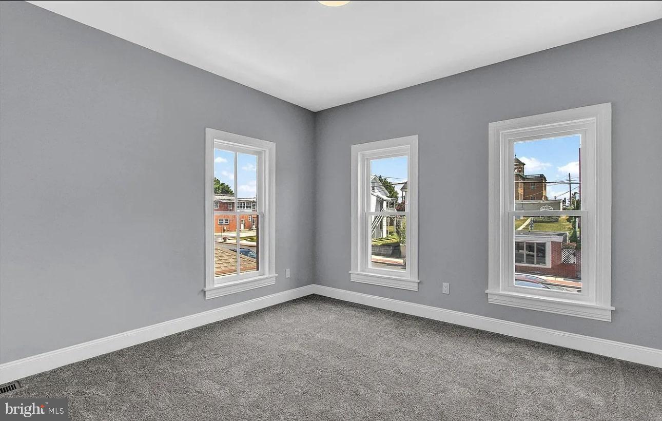 56 North Main Street Spring Grove, PA 17362 - Photo 12 of 25 an empty room with windows