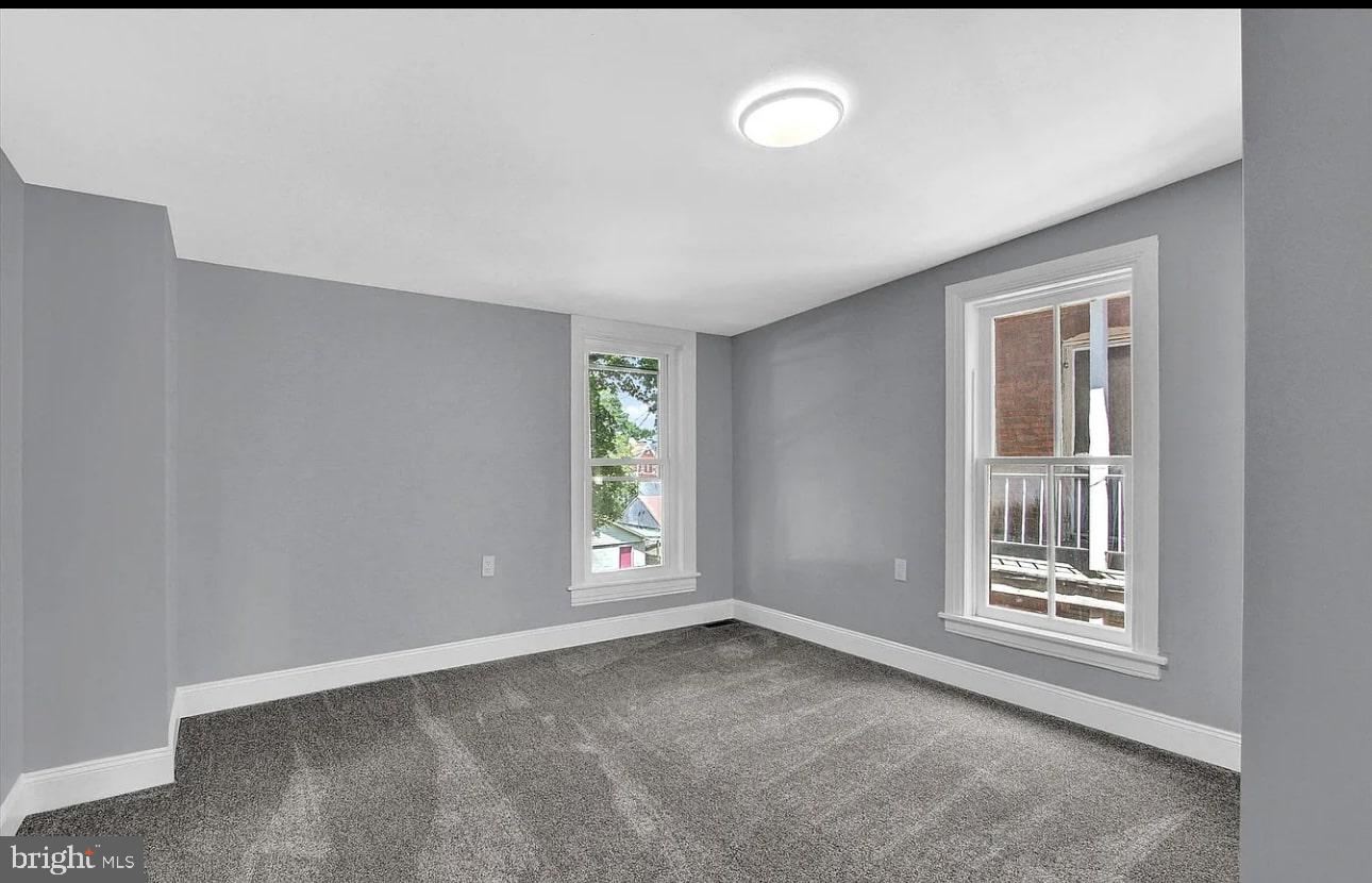 56 North Main Street Spring Grove, PA 17362 - Photo 15 of 25 a view of an empty room with a window
