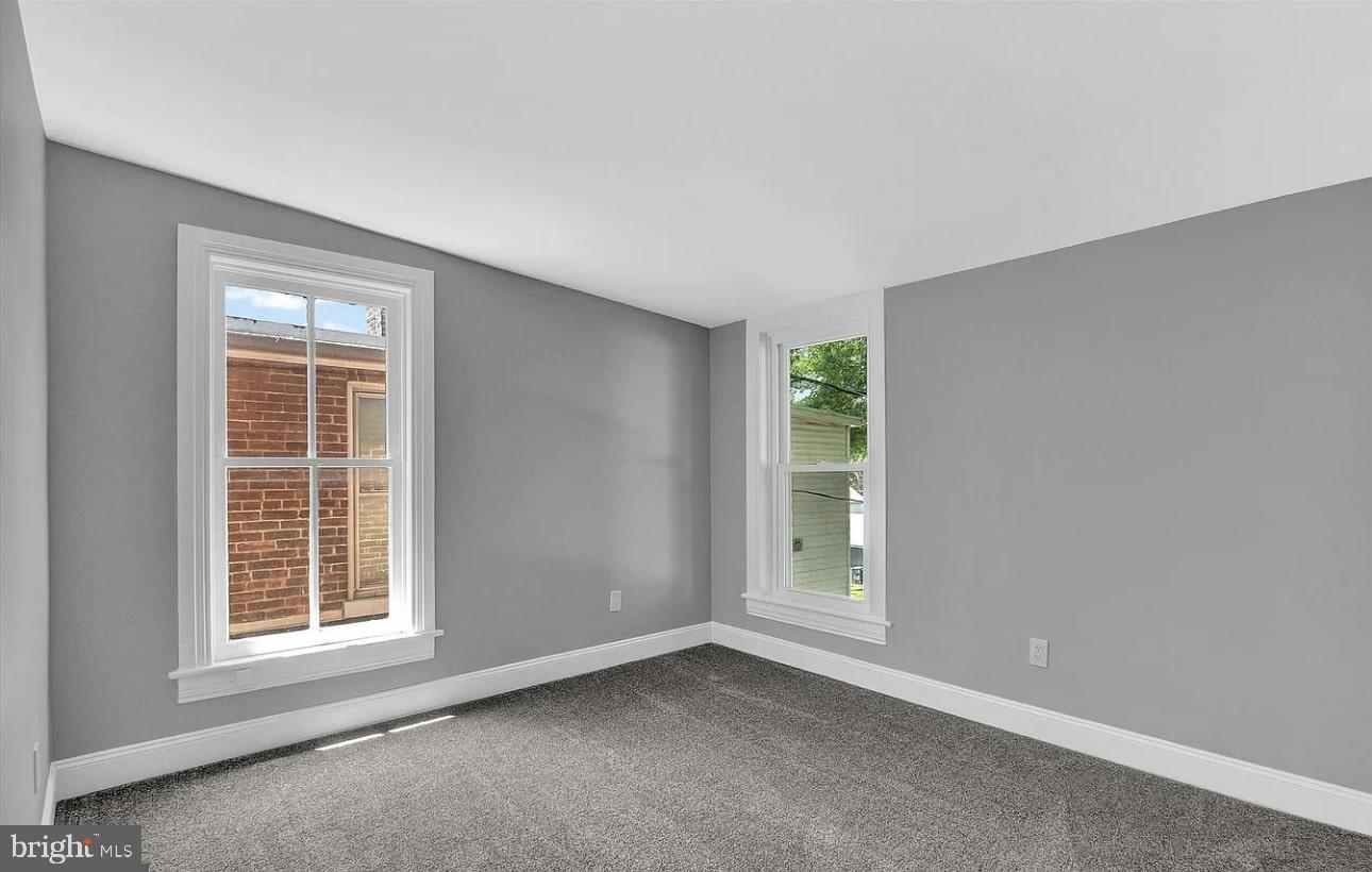56 North Main Street Spring Grove, PA 17362 - Photo 17 of 25 an empty room with a window